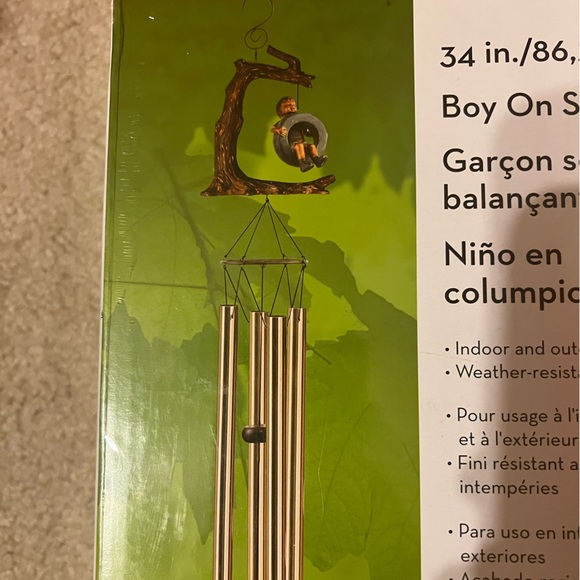 34” Boy On Tire Swing Wind Chime new in seal - Picture 2 of 4